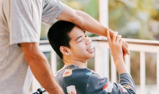 disabled-kid-with-caregiver (1)