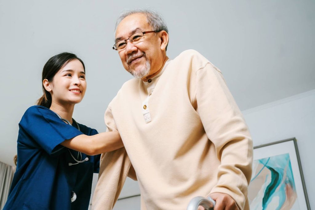 elderlyman-with-nurse Compassionate care in Gaithersburg MD by Nayab Care LLC caregivers