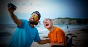 man-taking-selfie-with-a-disabled-boy-2