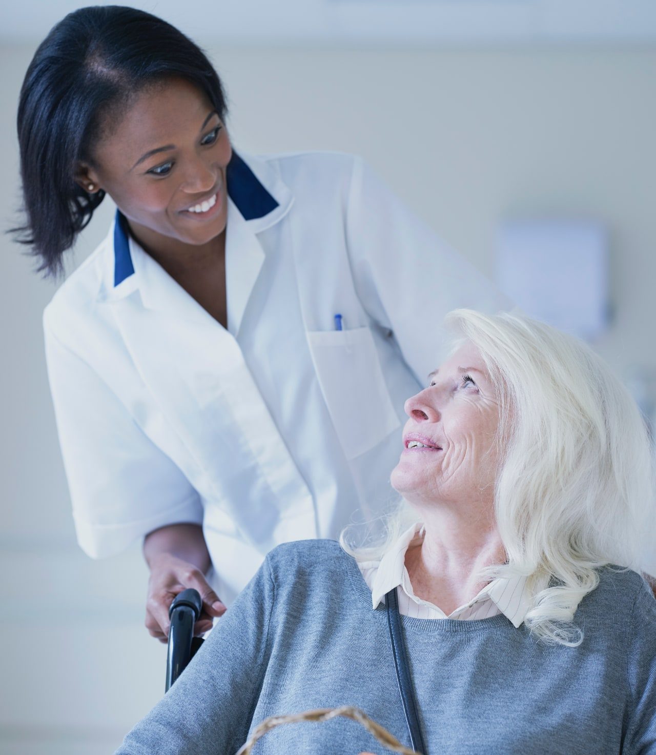 hospital-orderly-pushing-senior-female-patient-in-2025-04-03-18-05-46-utc (1)